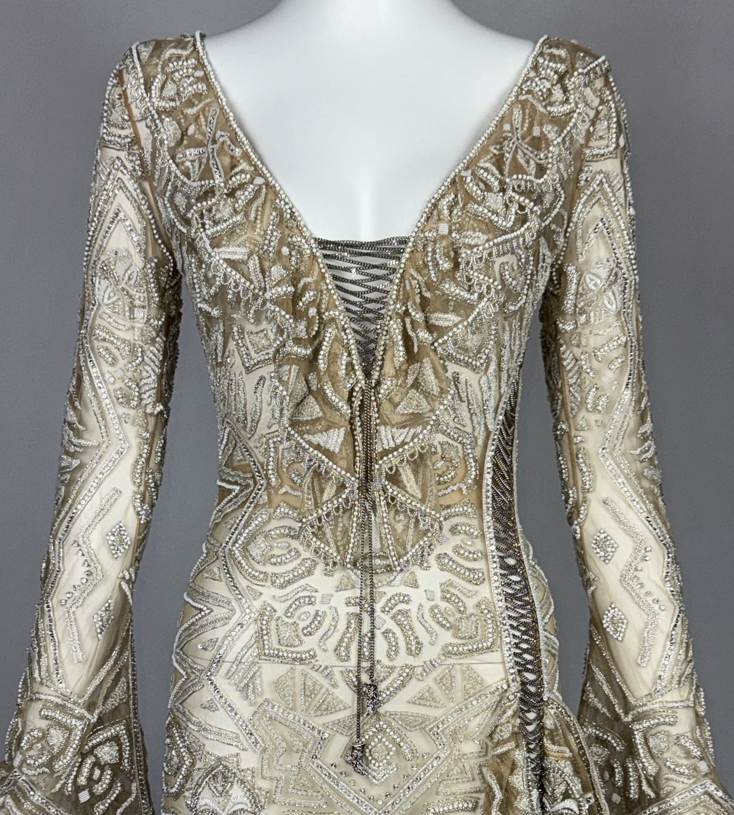 C. 2011 Roberto Cavalli Couture Numbered Plunging Sheer Nude African Tribal Masai Mask Beaded Chain Corset Gown Dress w Bell Sleeves